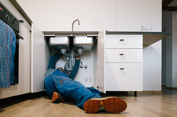 Professional Emergency Plumber technician working in Angola, NY